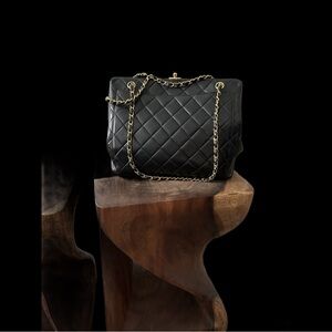 Luxurious  Vintage CHANEL Black Quilted Shoulder Bag.